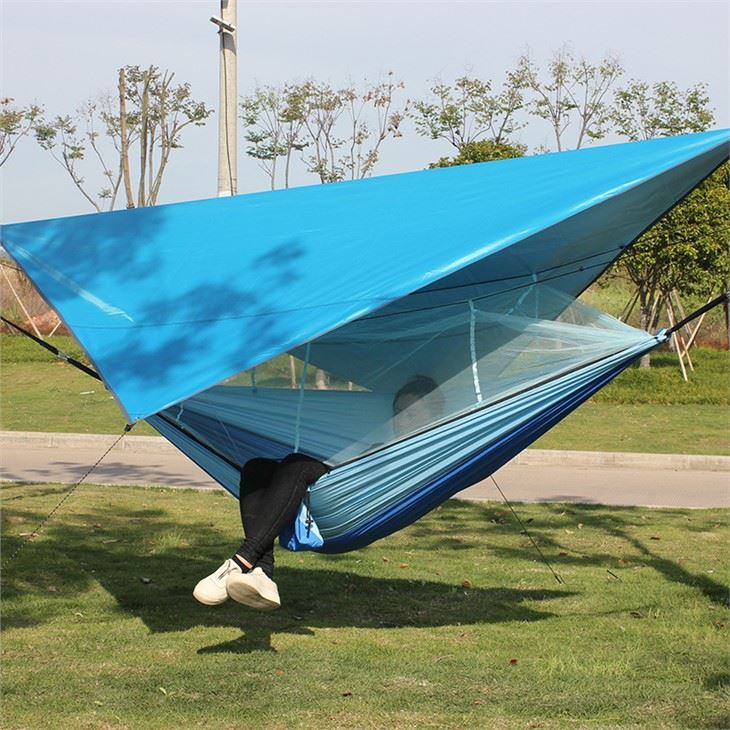blue mosquito net hammock with rainy